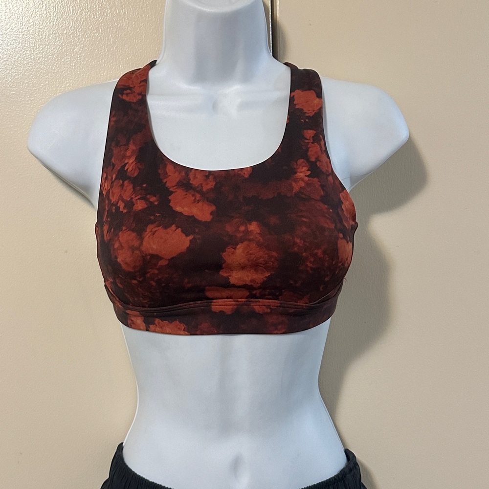 Orange and brown floral sports bra